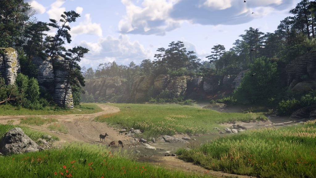 Paysage du jeu Kingdom Come: Deliverance 2 avec une vallée traversée par une petite rivière et une route de terre, des arbres sur parois rocheuse et un ciel bleu nuageux.